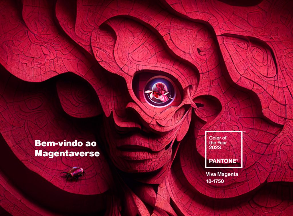 Em uma arte ilustrativa da pantone é apresentada a cor de ano 2023, a Viva Magenta. Na arte é possível ver o que aparenta ser a representação de um rosto na tonalidade da cor. Informações da numeração da paleta estão descritas, junto ao slogan “Bem-vindo ao Magentaverse”. 