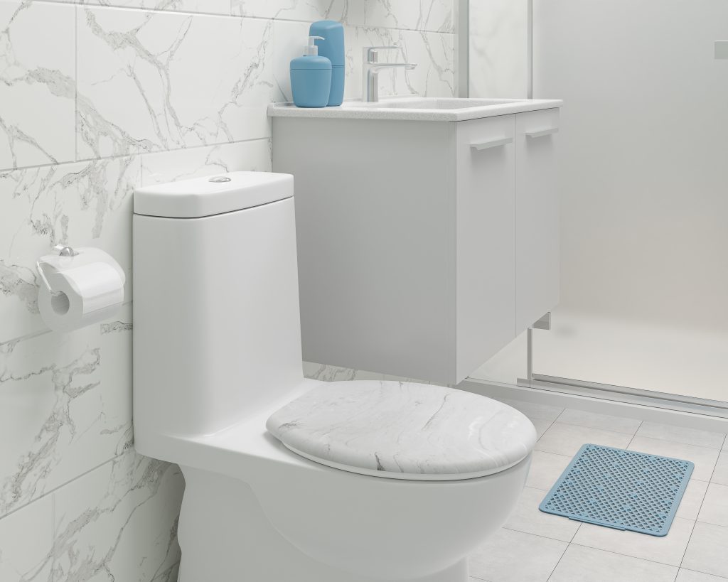 Imagem de um banheiro clean e moderno com vaso sanitário e pia brancos. O vaso sanitário é um modelo moderno com descarga eficiente. A pia tem um design simples e elegante. O gabinete da pia oferece espaço de armazenamento interno. 