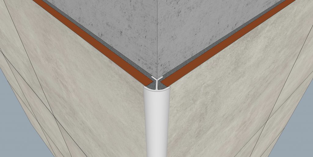 Cantoneira de embutir instalada em uma parede de azulejos. Imagem mostra como a instalação fica após o assentamento do revestimento